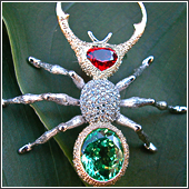 Hand fabricated diamond, ruby and tsavorite broache